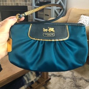 Teal blue Coach wristlet